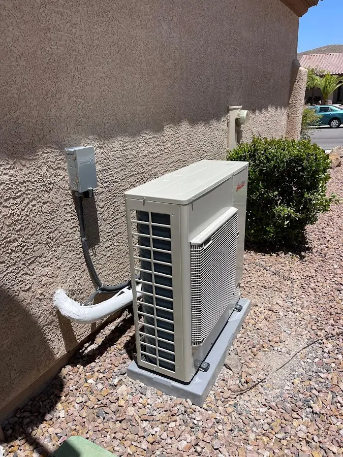 Residential air conditioning condenser unit in Happy Valley